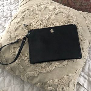 Cole Haan  patent leather wristlet.